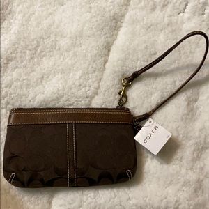 Coach wristlet signature leather trim New with tag